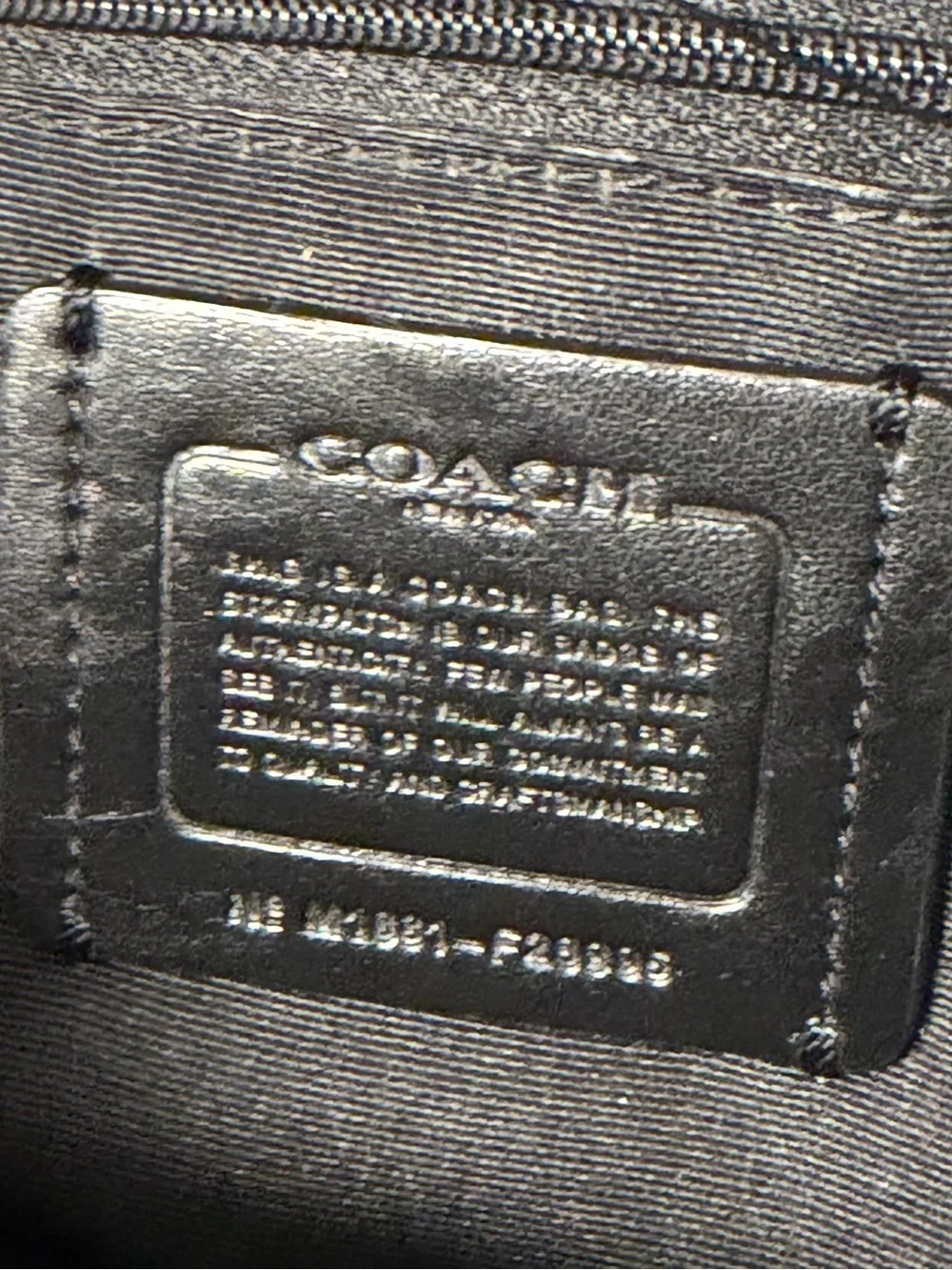 Coach black pebbled